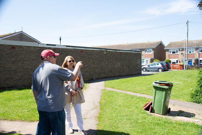Martin Devanney speaks to a local resident about fly tipping